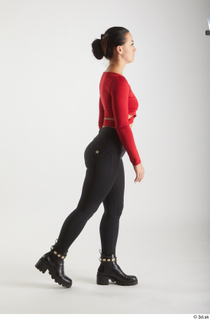  Zuzu Sweet  1 black boots black trousers casual dressed red long sleeve t shirt side view walking whole body 0005.jpg